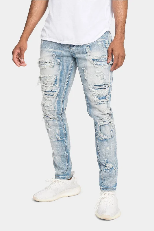 Distressed Patched Super Skinny Jeans